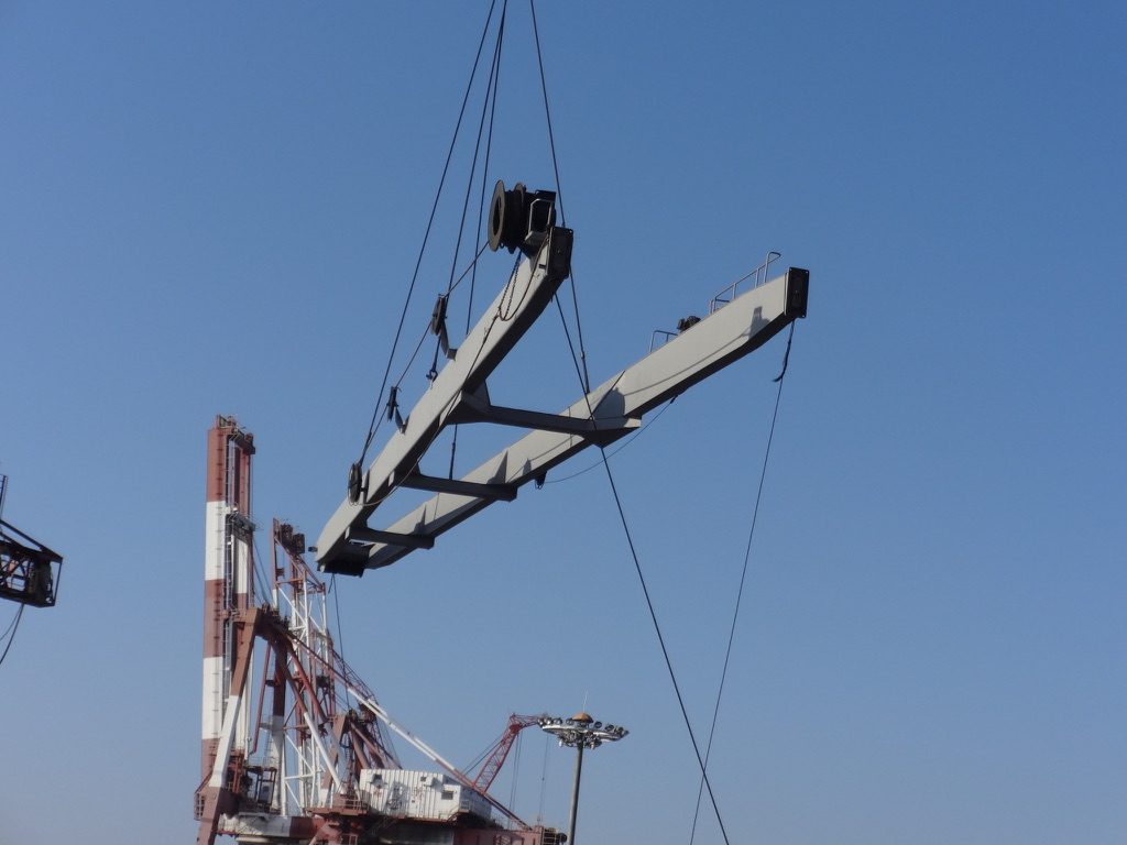 Crane jib lifted clear of a deck crane during repairs